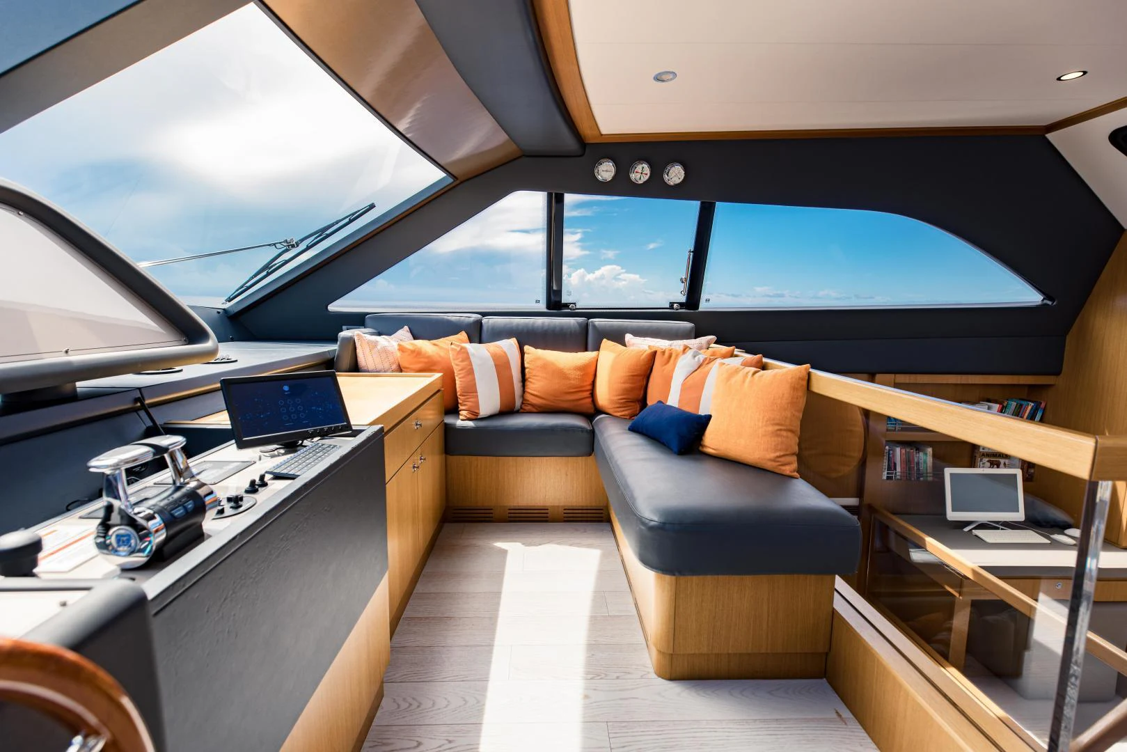 a room with a couch and a laptop aboard SHE RUNS WET Yacht for Sale