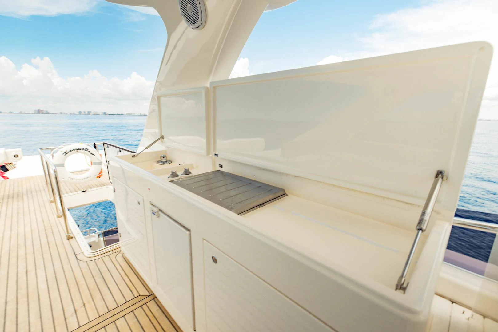 a boat on a deck aboard SHE RUNS WET Yacht for Sale