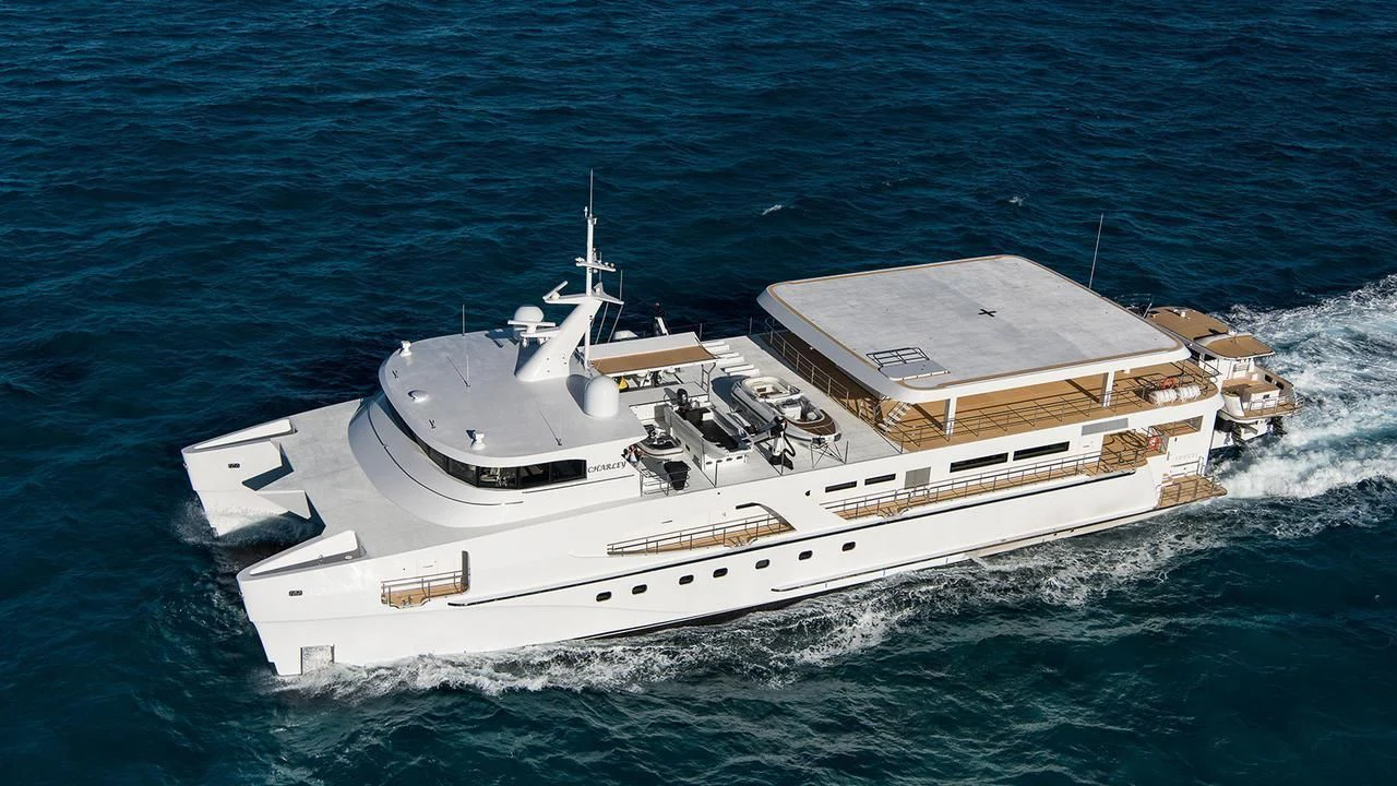 a large white boat in the water aboard CHARLEY Yacht for Sale