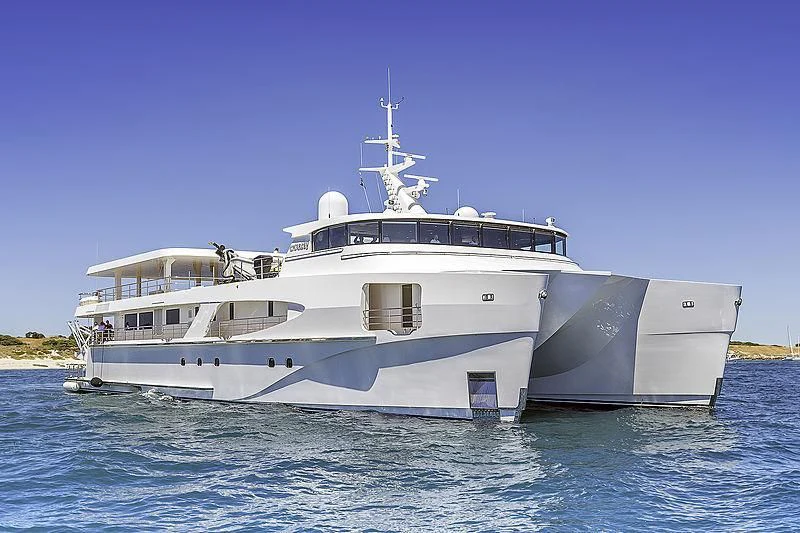a large white boat in the water aboard CHARLEY Yacht for Sale