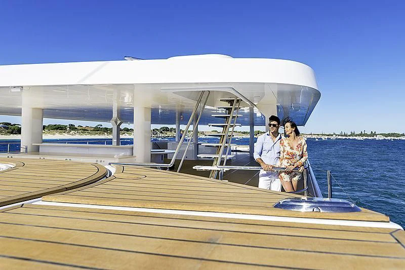 a man and woman on a boat aboard CHARLEY Yacht for Sale