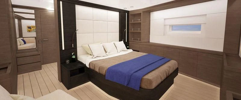 a room with a bed and a desk aboard SEATIUS Yacht for Sale