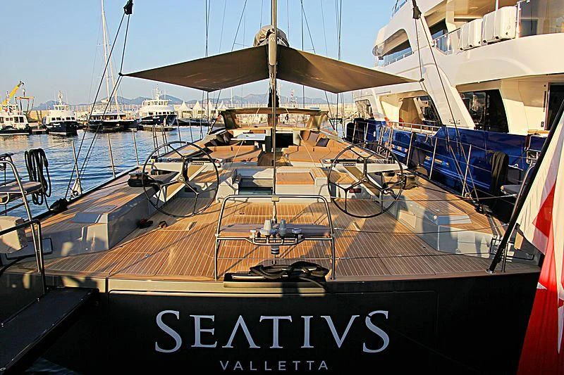 a boat dock with many boats aboard SEATIUS Yacht for Sale