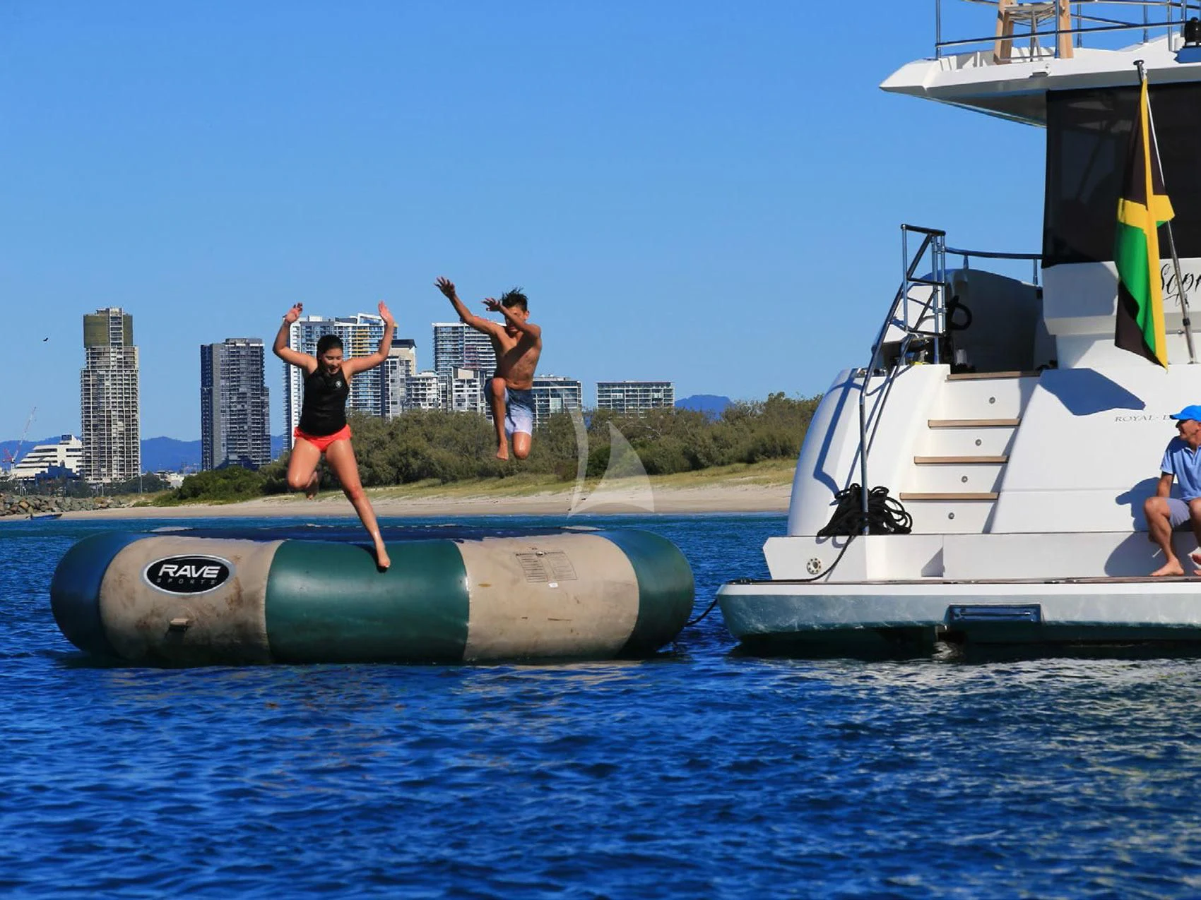 people jumping off of a boat aboard SOPHIA Yacht for Sale