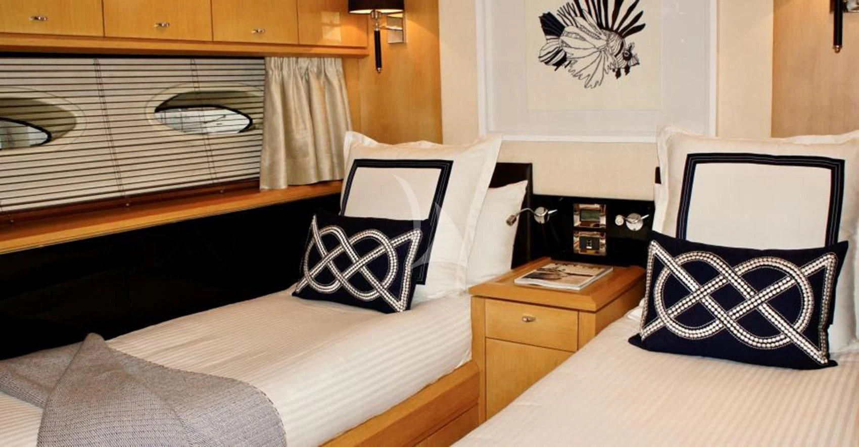 a room with a bed and a desk aboard SOPHIA Yacht for Sale