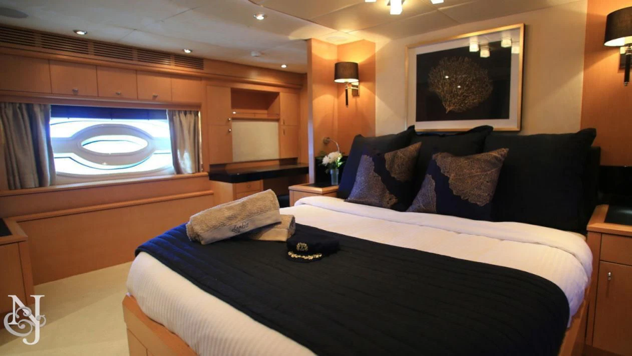 a bedroom with a large bed aboard SOPHIA Yacht for Sale