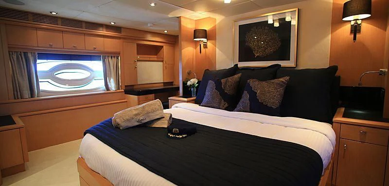 a bed in a room aboard SOPHIA Yacht for Sale