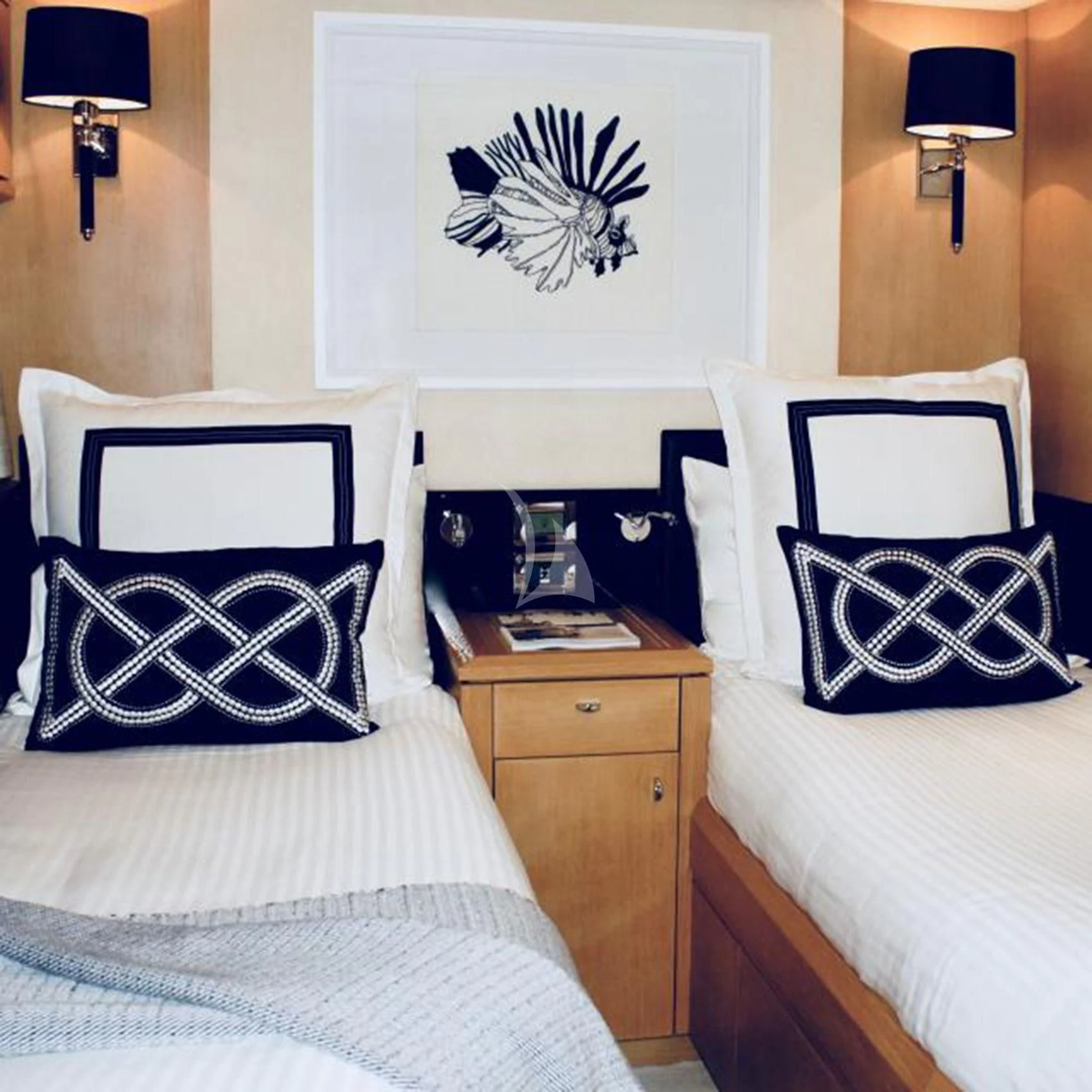 a bedroom with a bed and a desk aboard SOPHIA Yacht for Sale