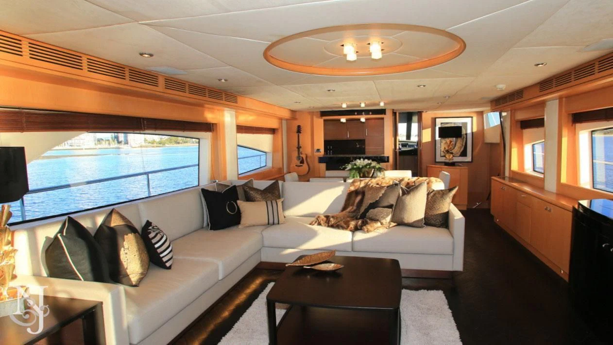 a living room with a large window aboard SOPHIA Yacht for Sale