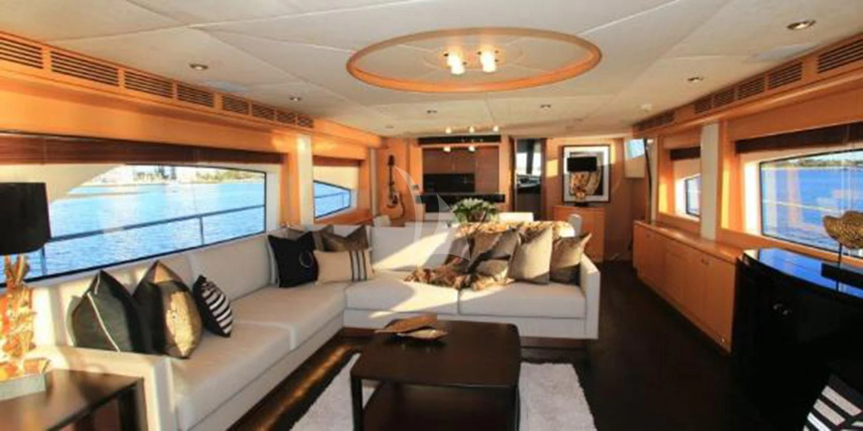 a living room with a large window aboard SOPHIA Yacht for Sale