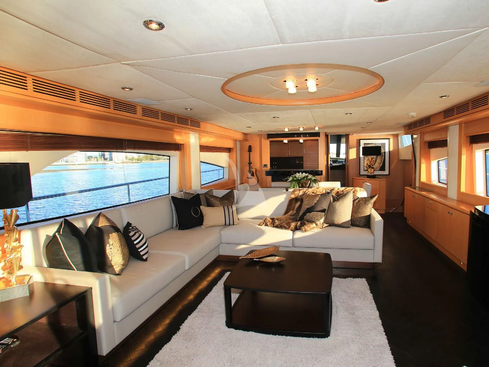 a living room with a large window aboard SOPHIA Yacht for Sale