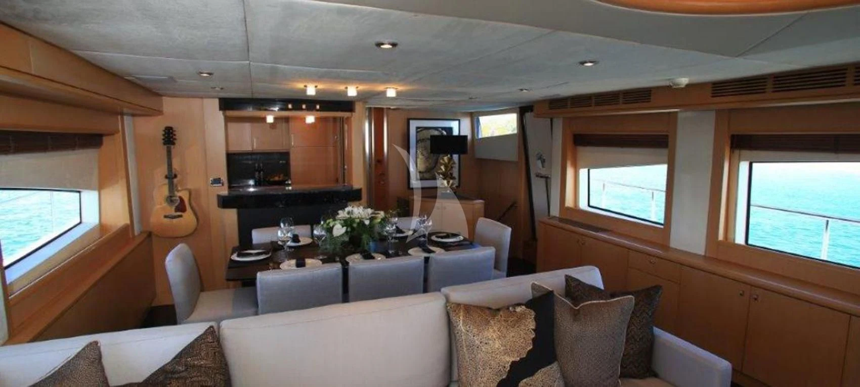 a living room with a couch and a television aboard SOPHIA Yacht for Sale