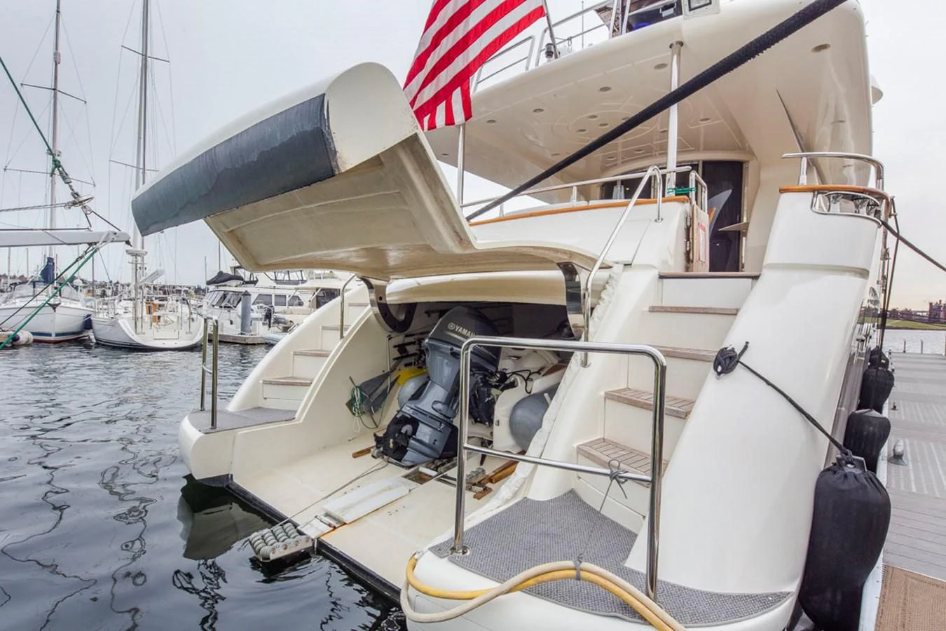 a boat with a flag on the front aboard SEA HAWK Yacht for Sale