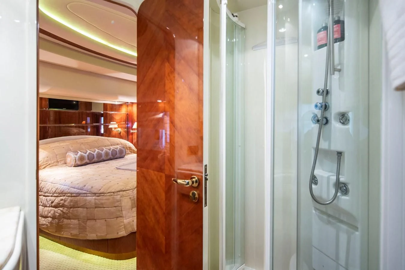 a room with a bed and a door aboard SEA HAWK Yacht for Sale