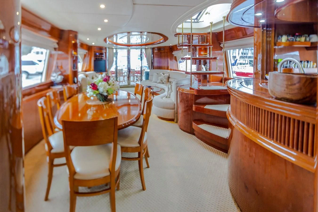 a dining room with a table and chairs aboard SEA HAWK Yacht for Sale