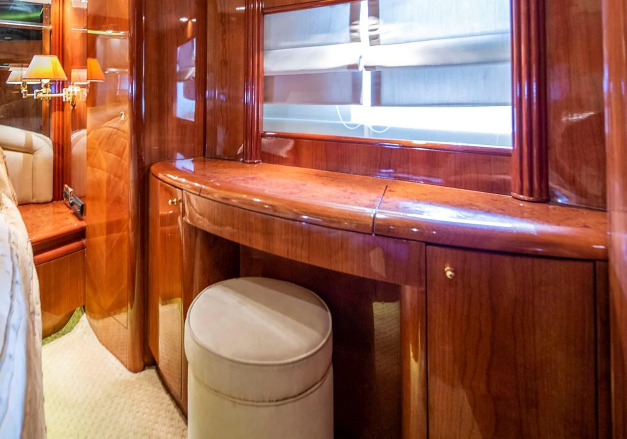 a toilet with a wooden seat aboard SEA HAWK Yacht for Sale
