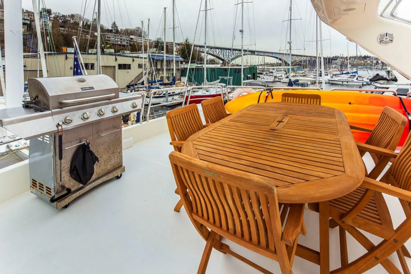 a wooden table and chairs on a boat aboard SEA HAWK Yacht for Sale