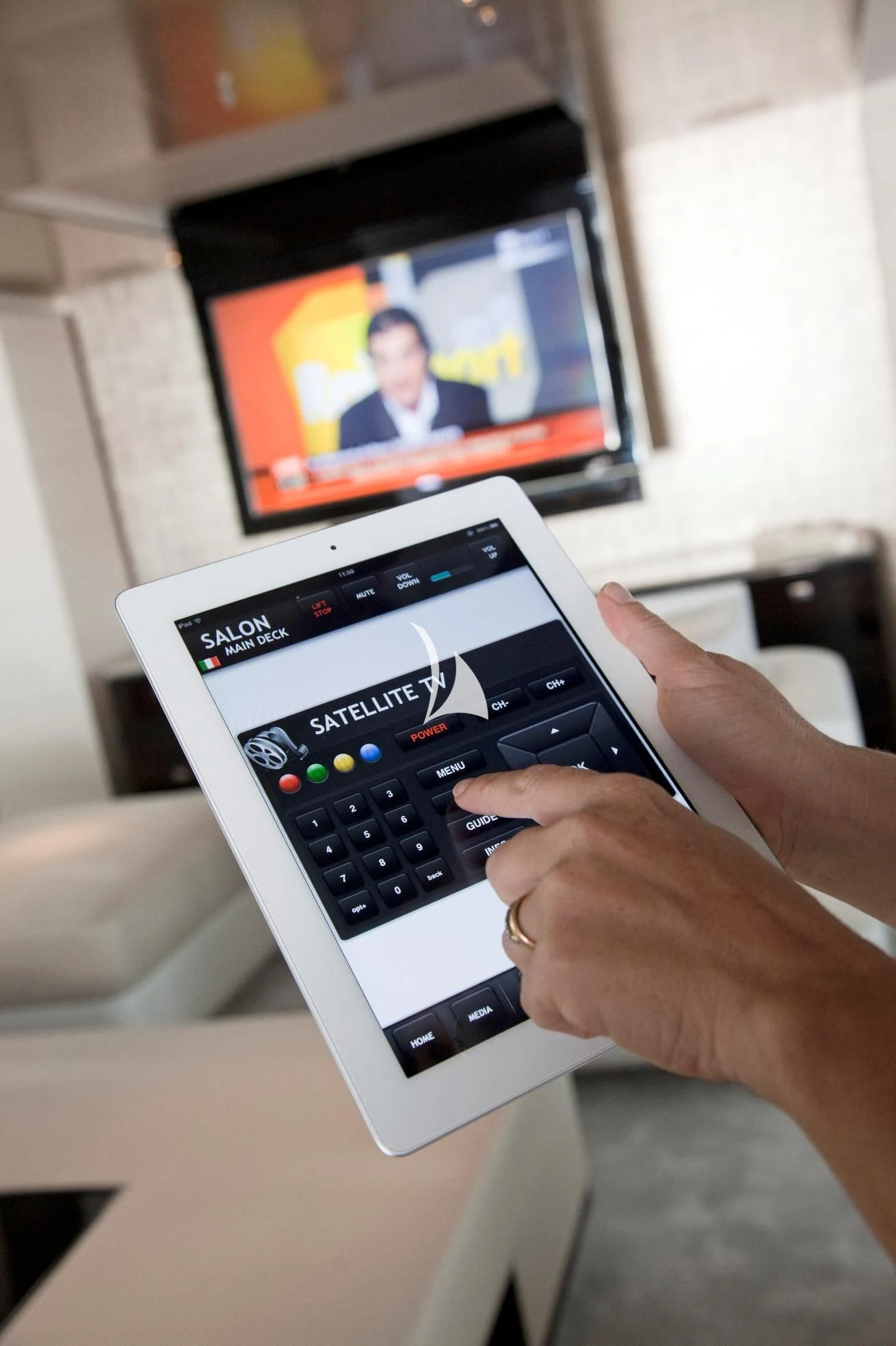 a person holding a tablet aboard ASLEC 4 Yacht for Sale