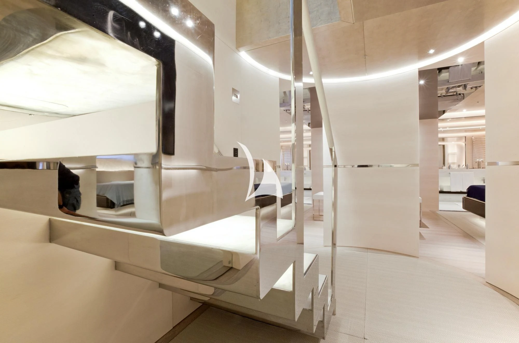 a large white room with a black object on the wall aboard ASLEC 4 Yacht for Sale
