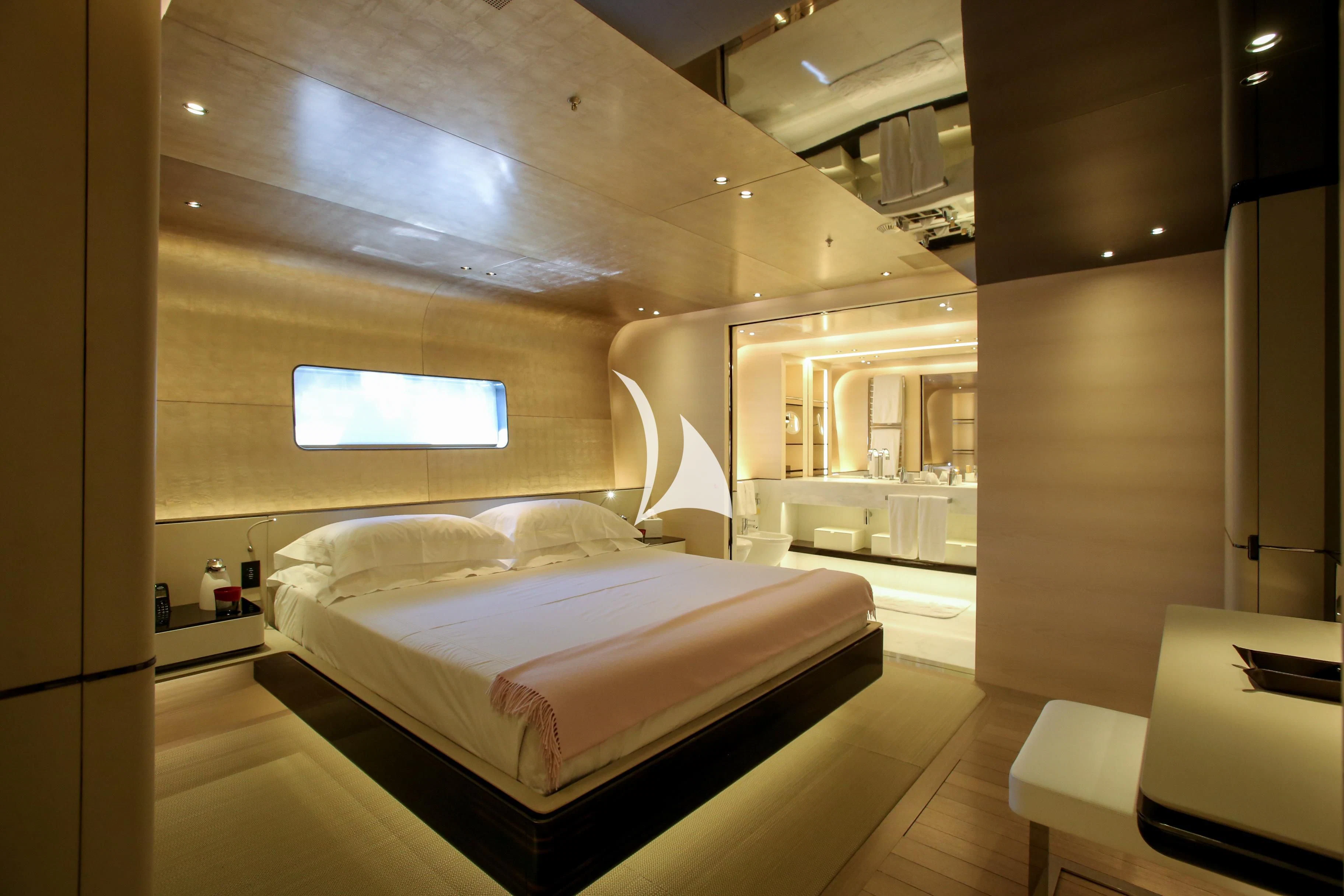 a room with a bed and a table aboard ASLEC 4 Yacht for Sale