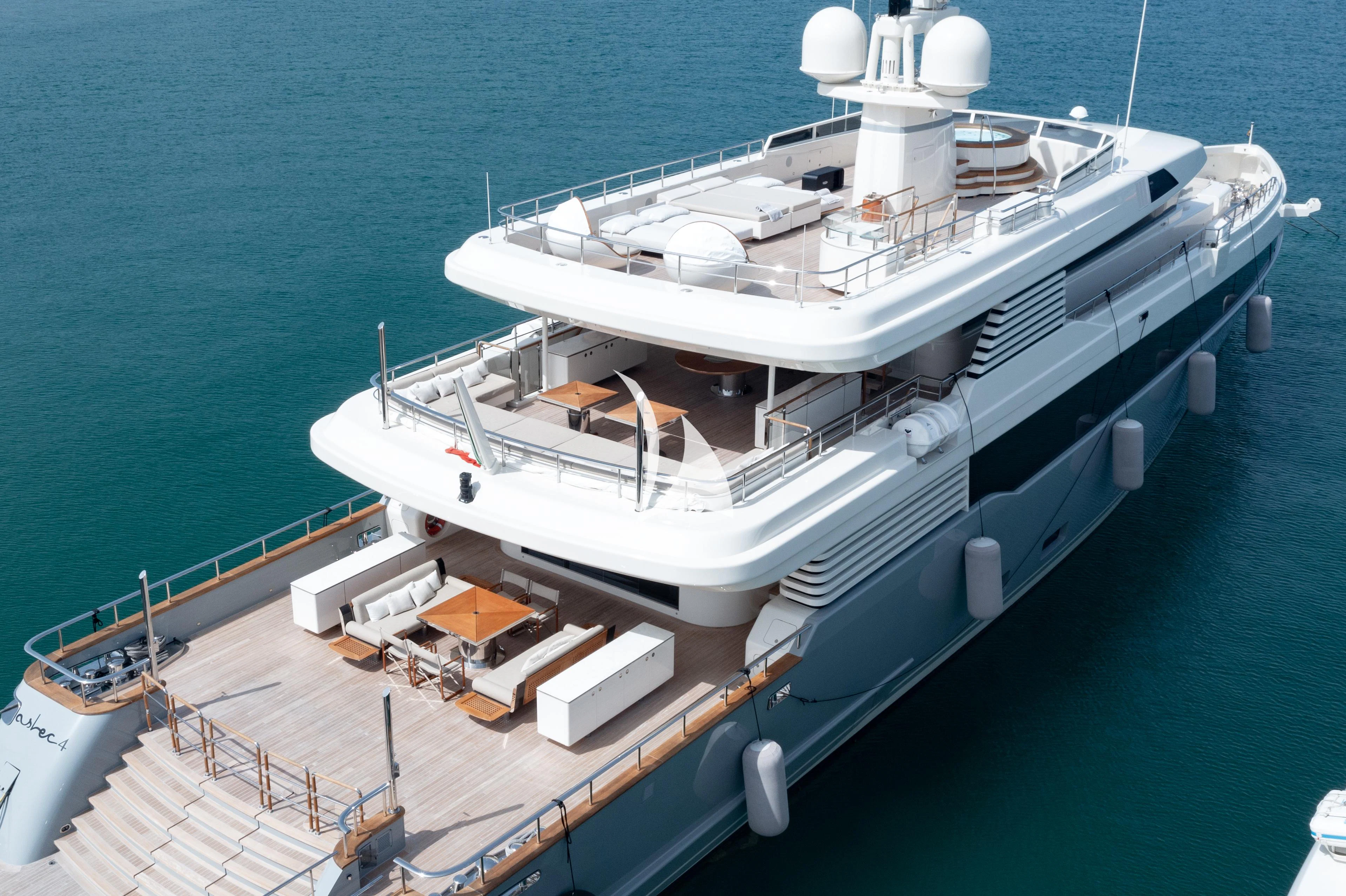 a large white boat on a body of water aboard ASLEC 4 Yacht for Sale