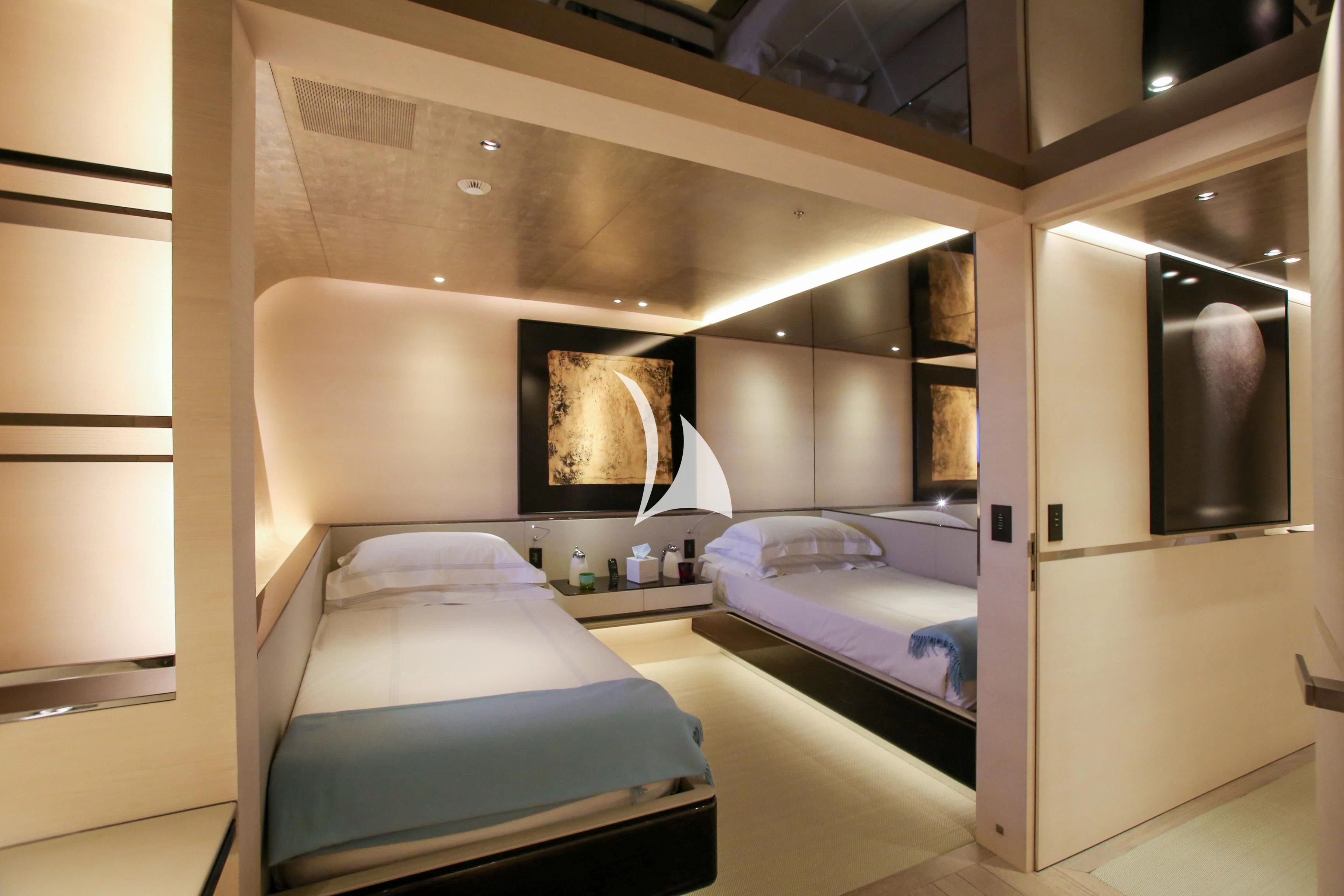 a room with a bed and a desk aboard ASLEC 4 Yacht for Sale
