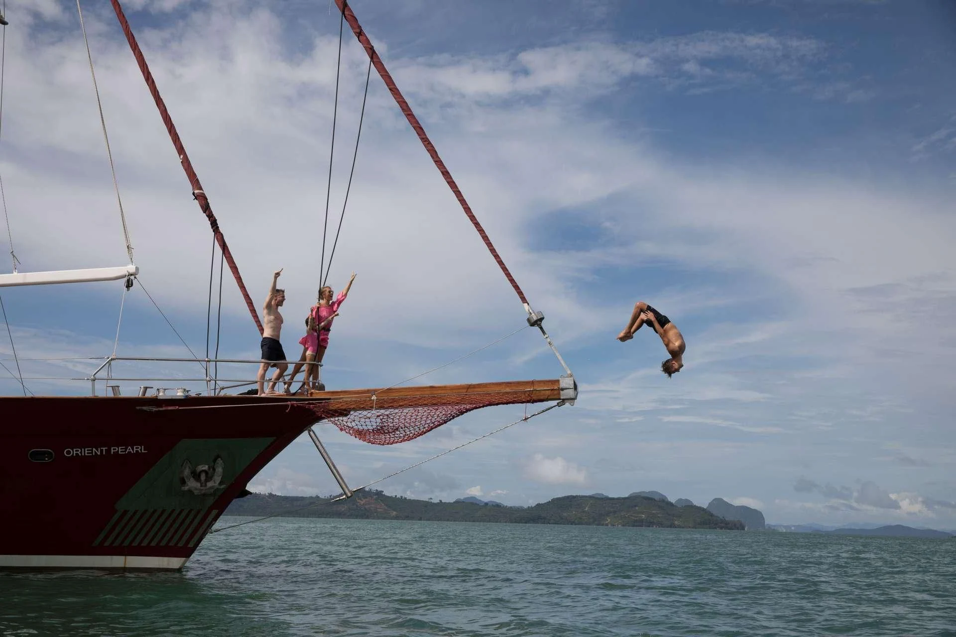 a couple of men on a boat aboard THE BLUE Yacht for Sale