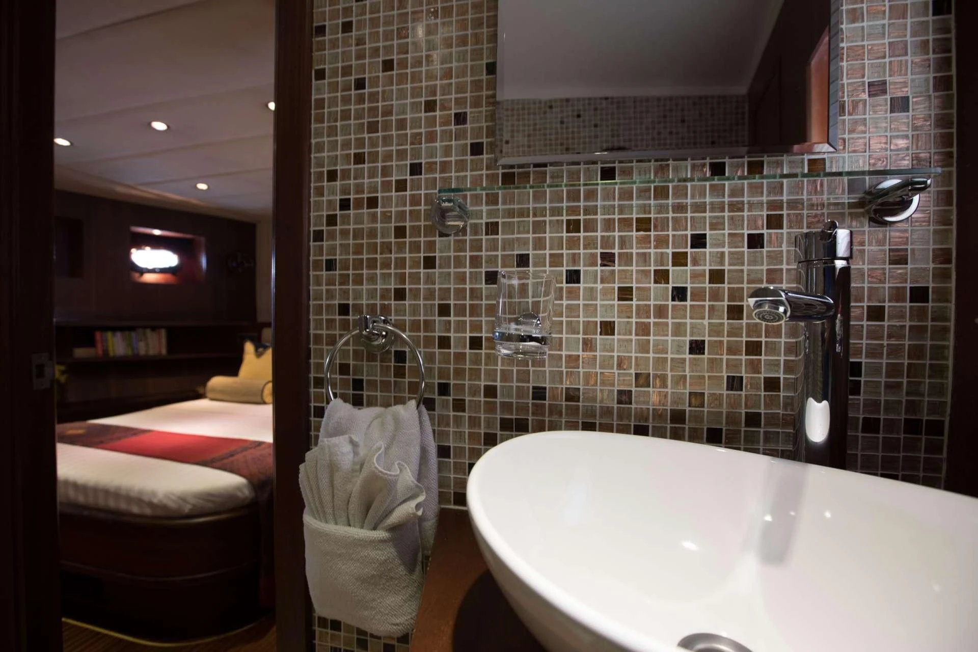 a bathroom with a bathtub and a sink aboard THE BLUE Yacht for Sale