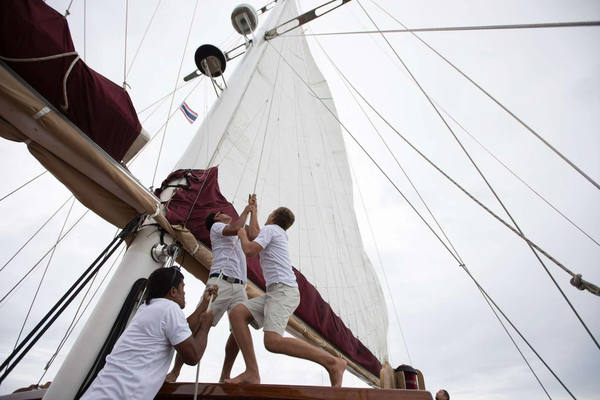 a group of people on a sailboat aboard THE BLUE Yacht for Sale