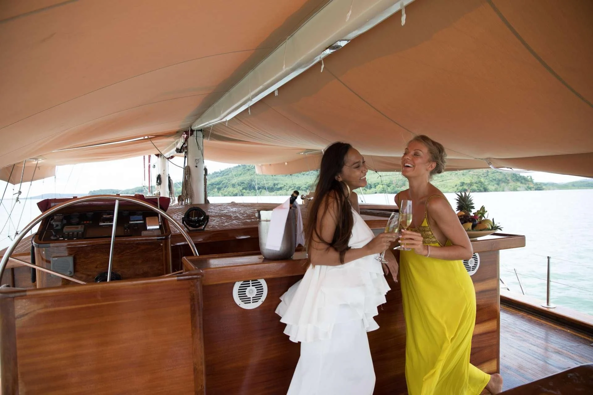 two women standing on a boat aboard THE BLUE Yacht for Sale