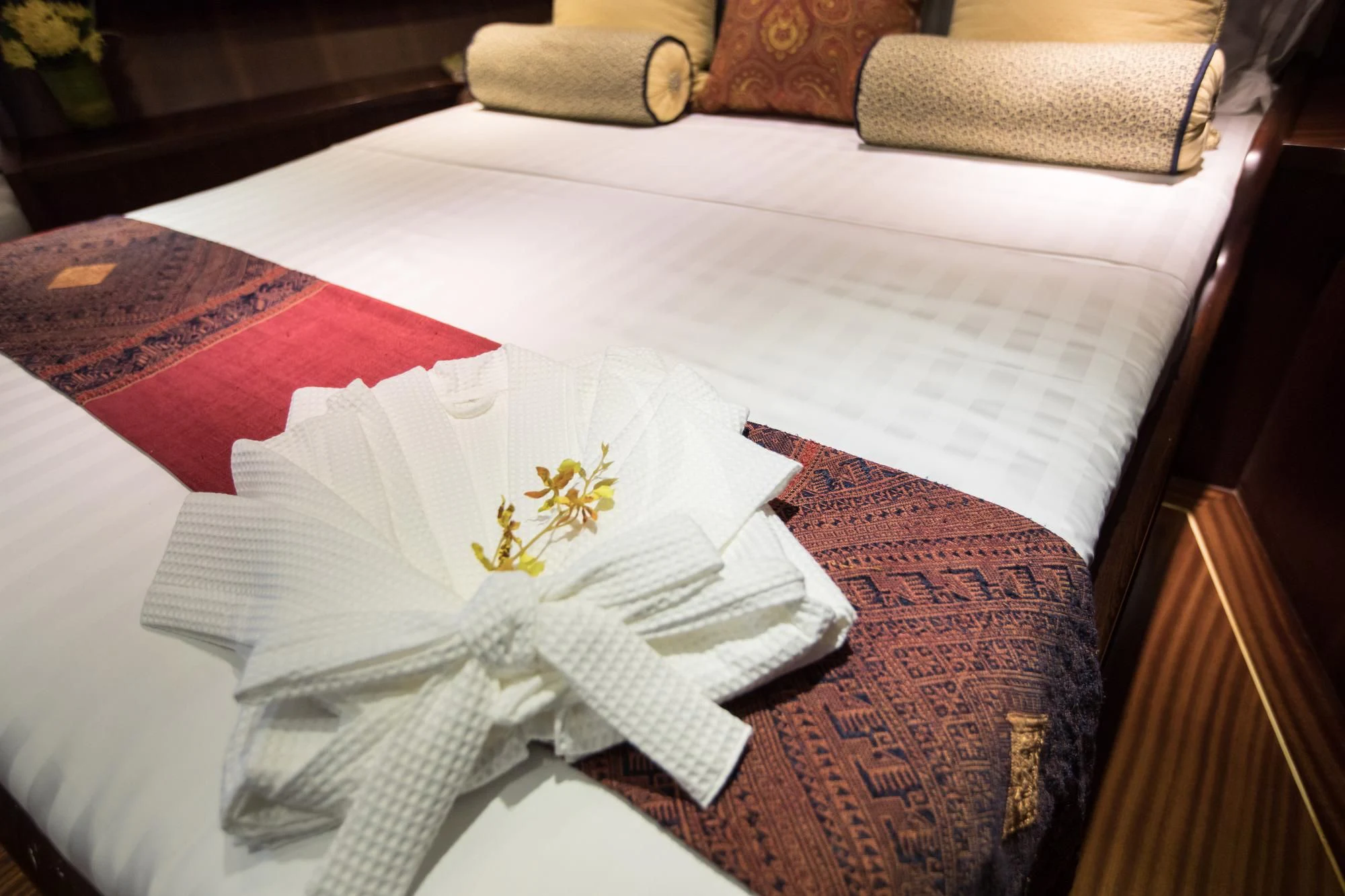 a table with folded napkins aboard THE BLUE Yacht for Sale