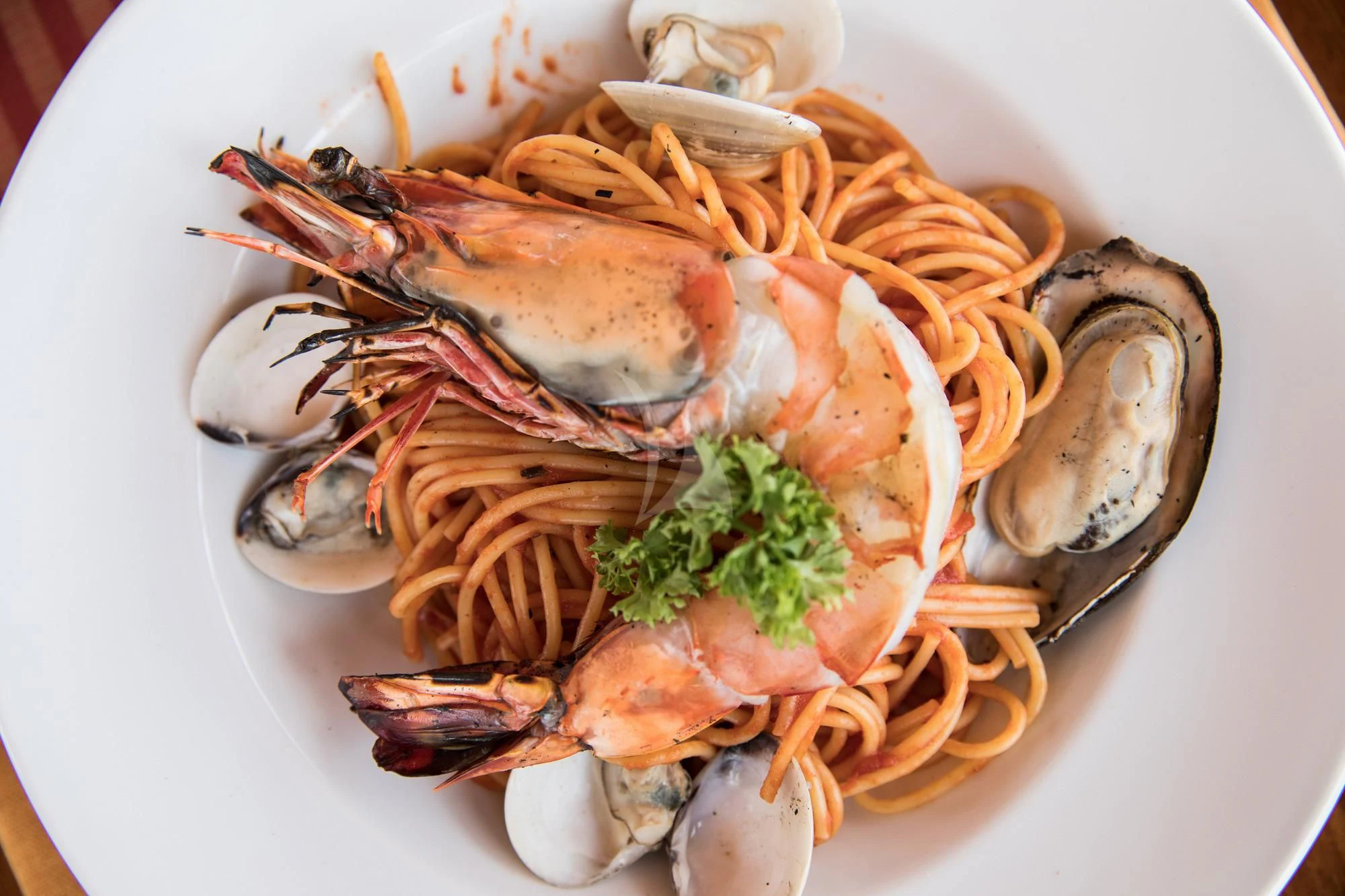 a plate of seafood aboard THE BLUE Yacht for Sale