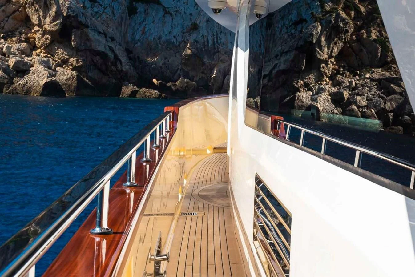 a long wooden bridge over water aboard LADY ALINA Yacht for Sale