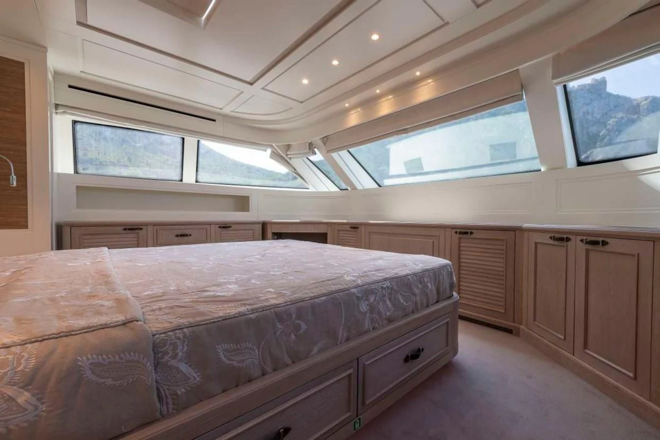 a bedroom with a bed aboard LADY ALINA Yacht for Sale