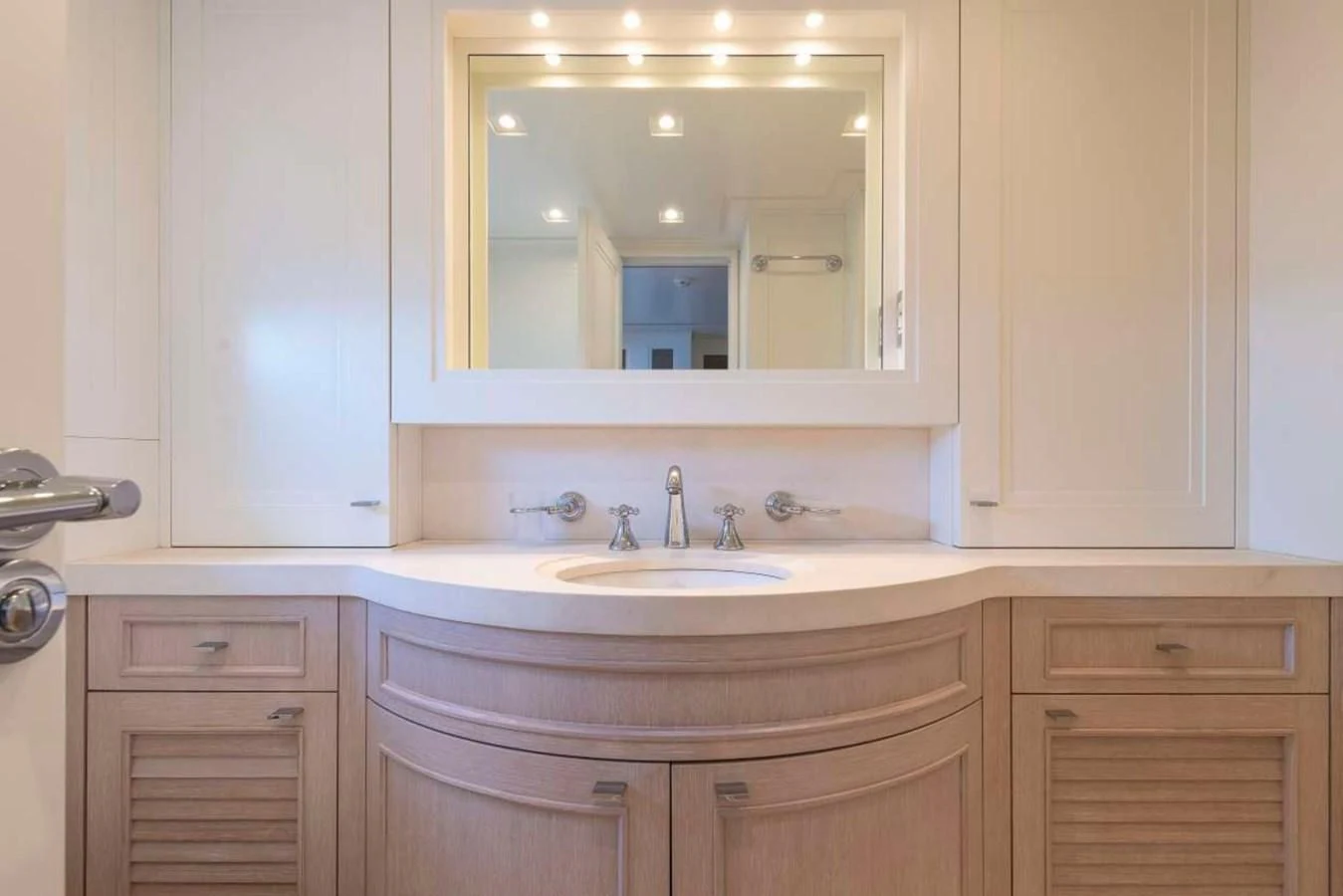 a bathroom with a large mirror aboard LADY ALINA Yacht for Sale