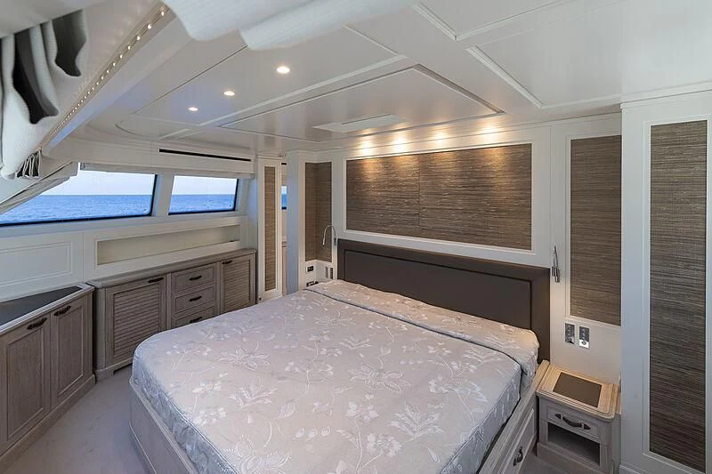 a large bedroom with a large bed aboard LADY ALINA Yacht for Sale