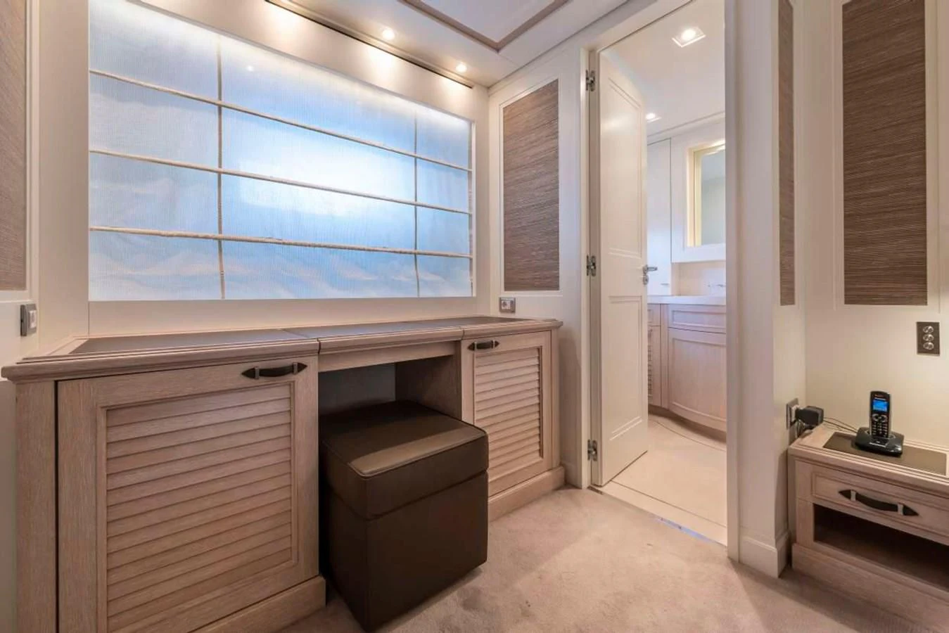 a room with a desk and a window aboard LADY ALINA Yacht for Sale