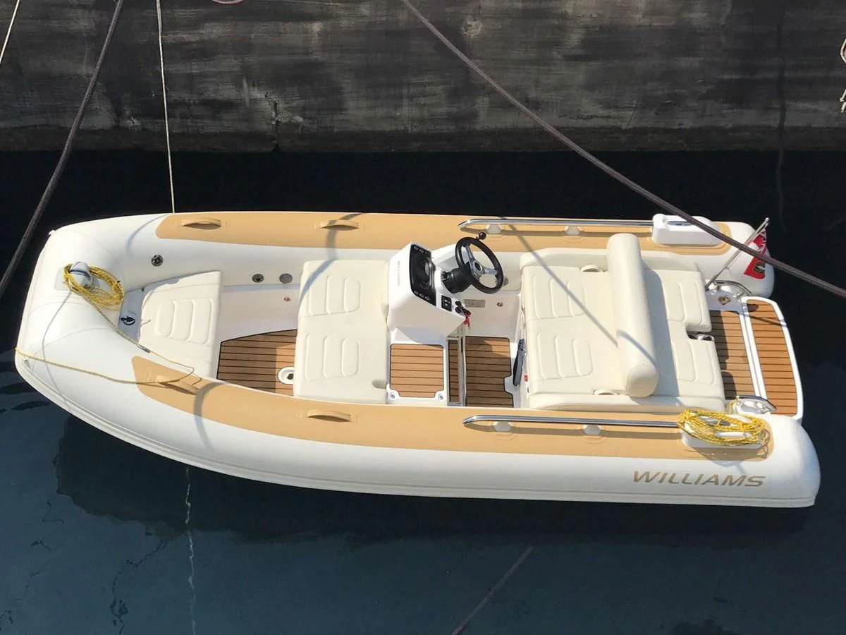 a white boat on water aboard LADY ALINA Yacht for Sale