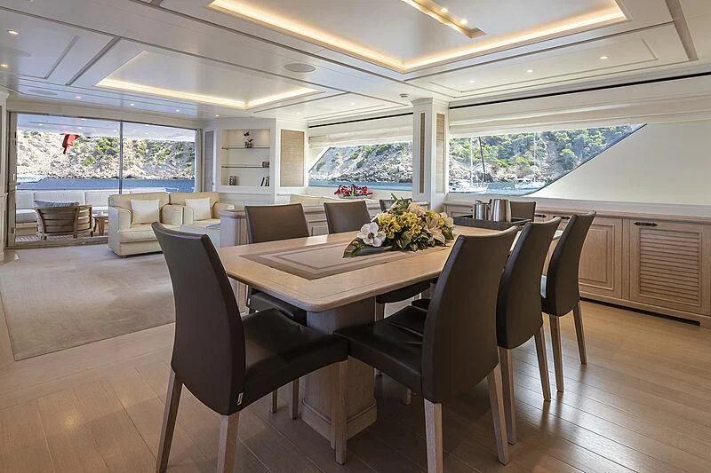 a large kitchen and dining room area aboard LADY ALINA Yacht for Sale