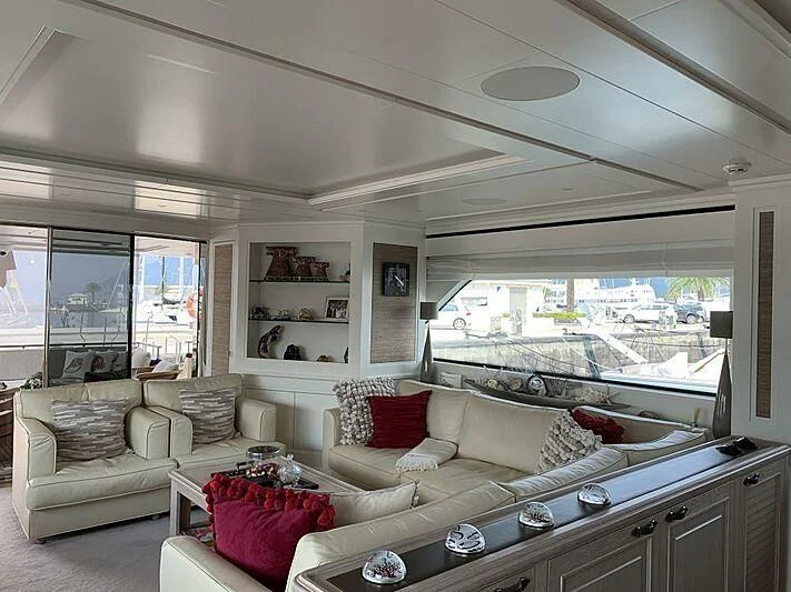 a living room with a large window aboard LADY ALINA Yacht for Sale