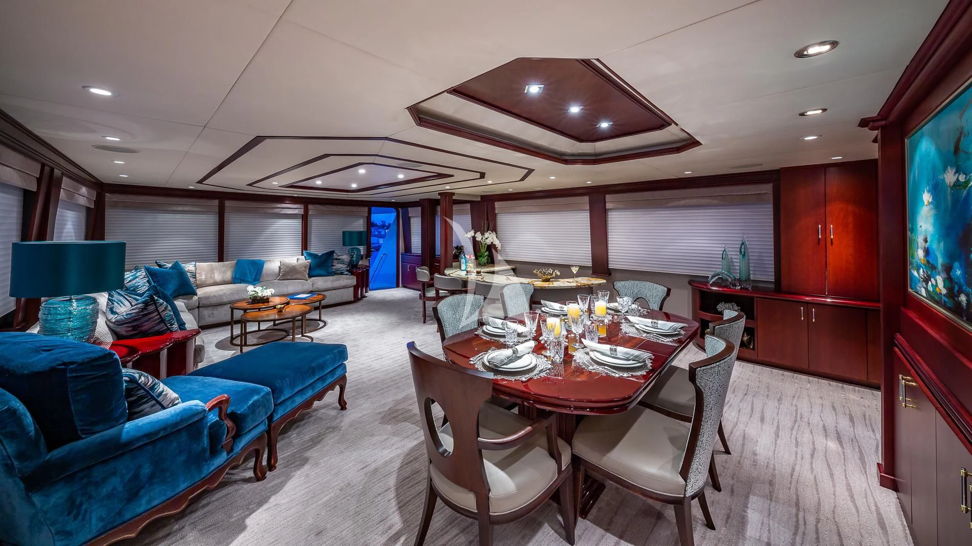 a dining room with a table and chairs aboard DESTINY Yacht for Sale