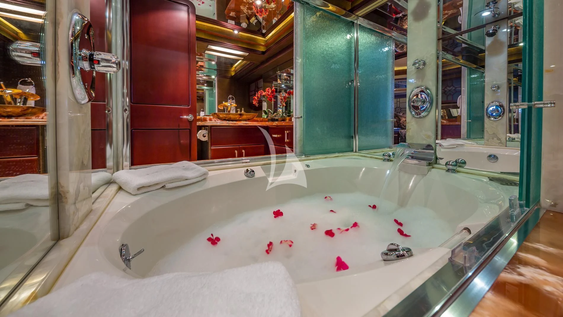 a bathtub in a bathroom aboard DESTINY Yacht for Sale