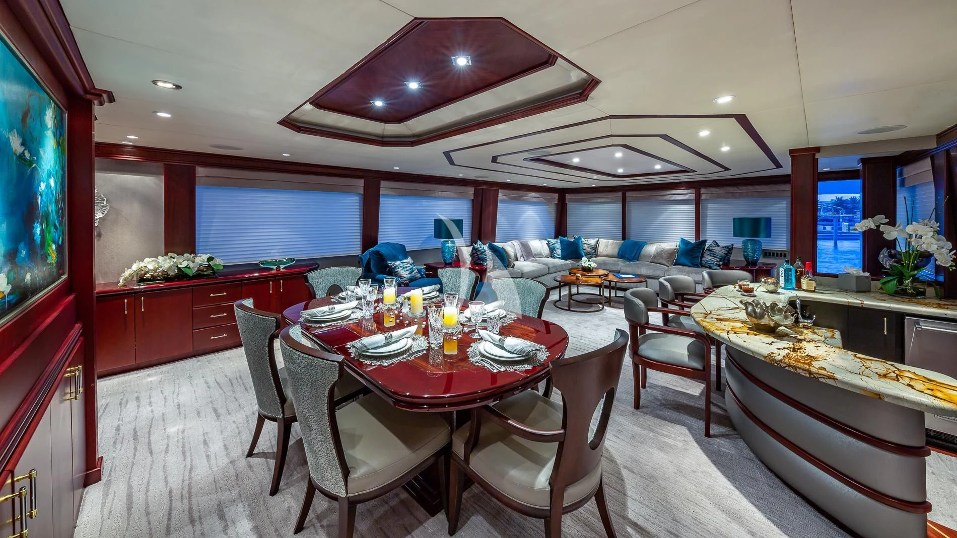 a dining room with a table and chairs aboard DESTINY Yacht for Sale