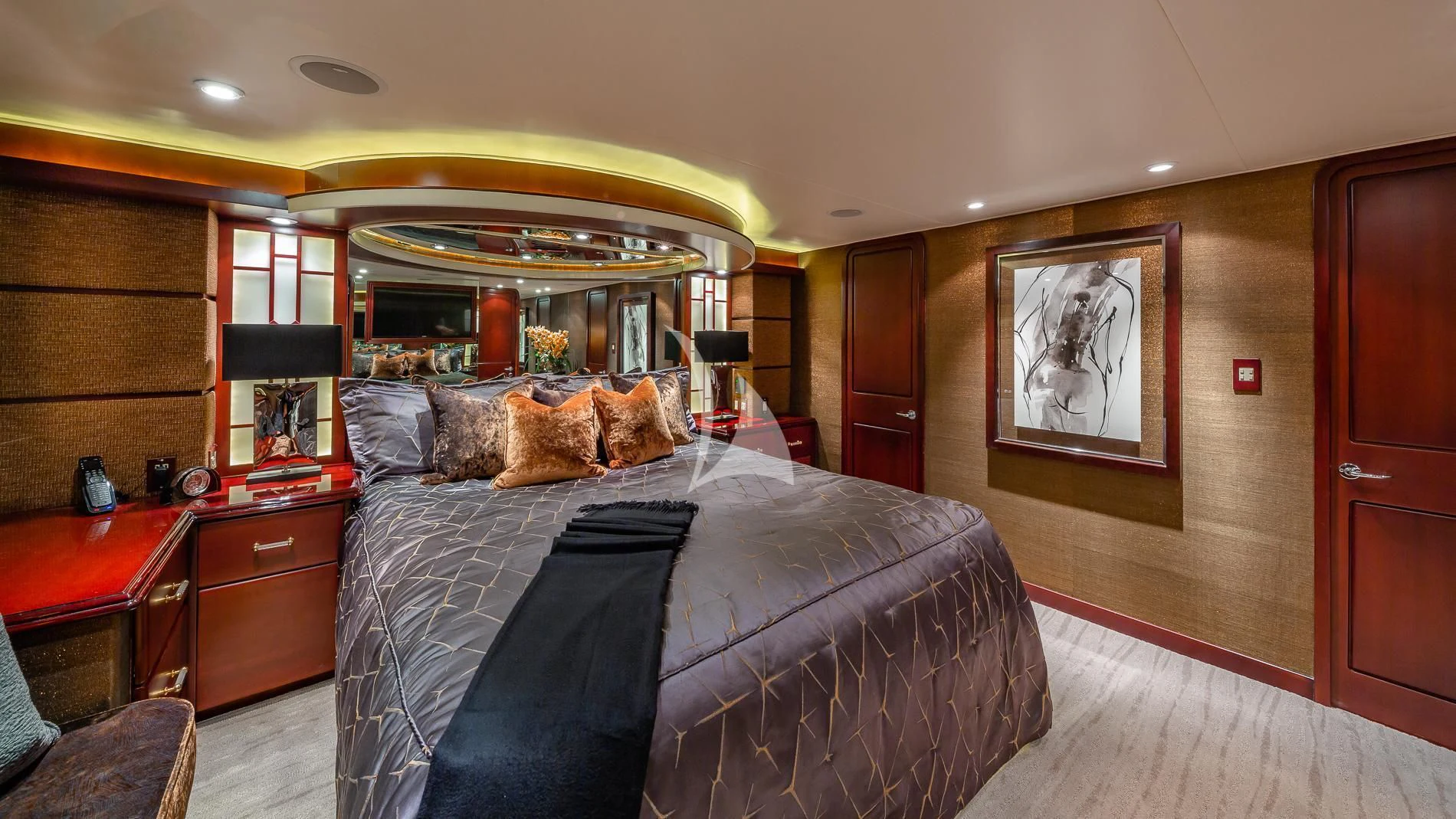a bedroom with a large bed aboard DESTINY Yacht for Sale