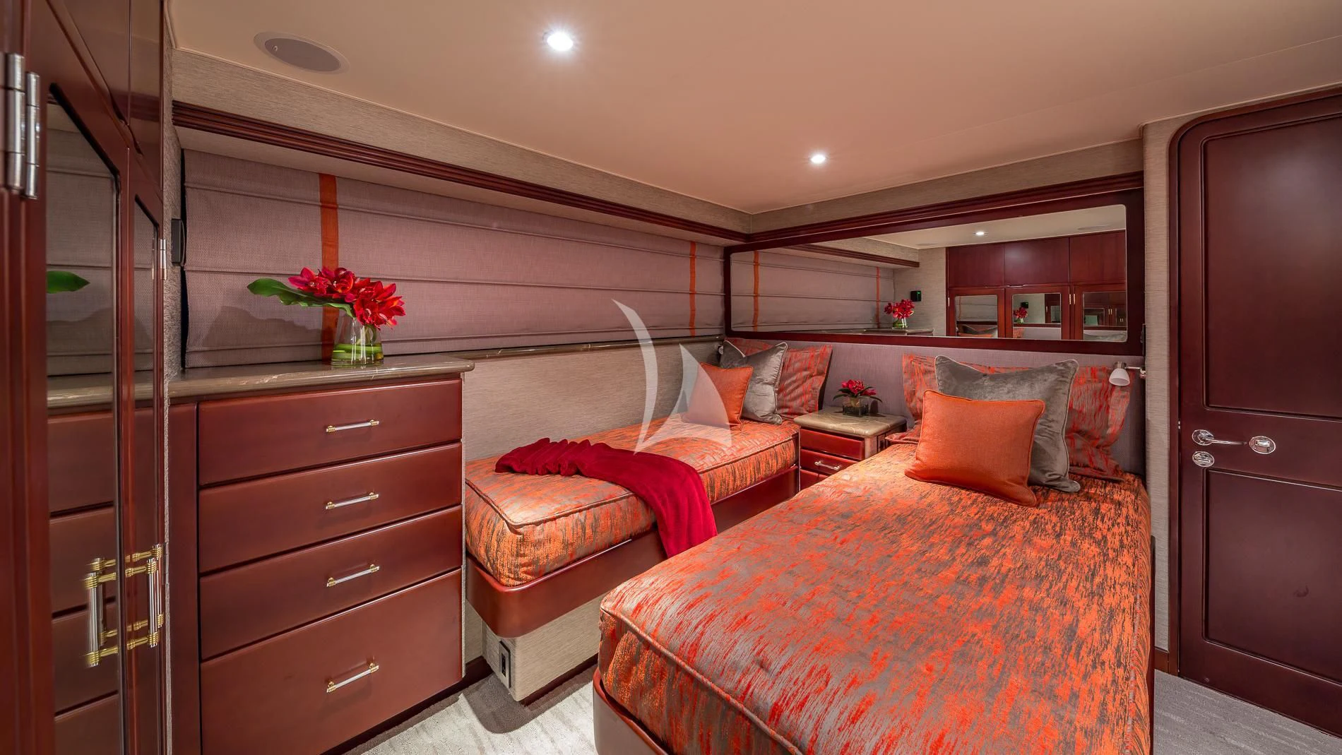 a bedroom with two beds aboard DESTINY Yacht for Sale