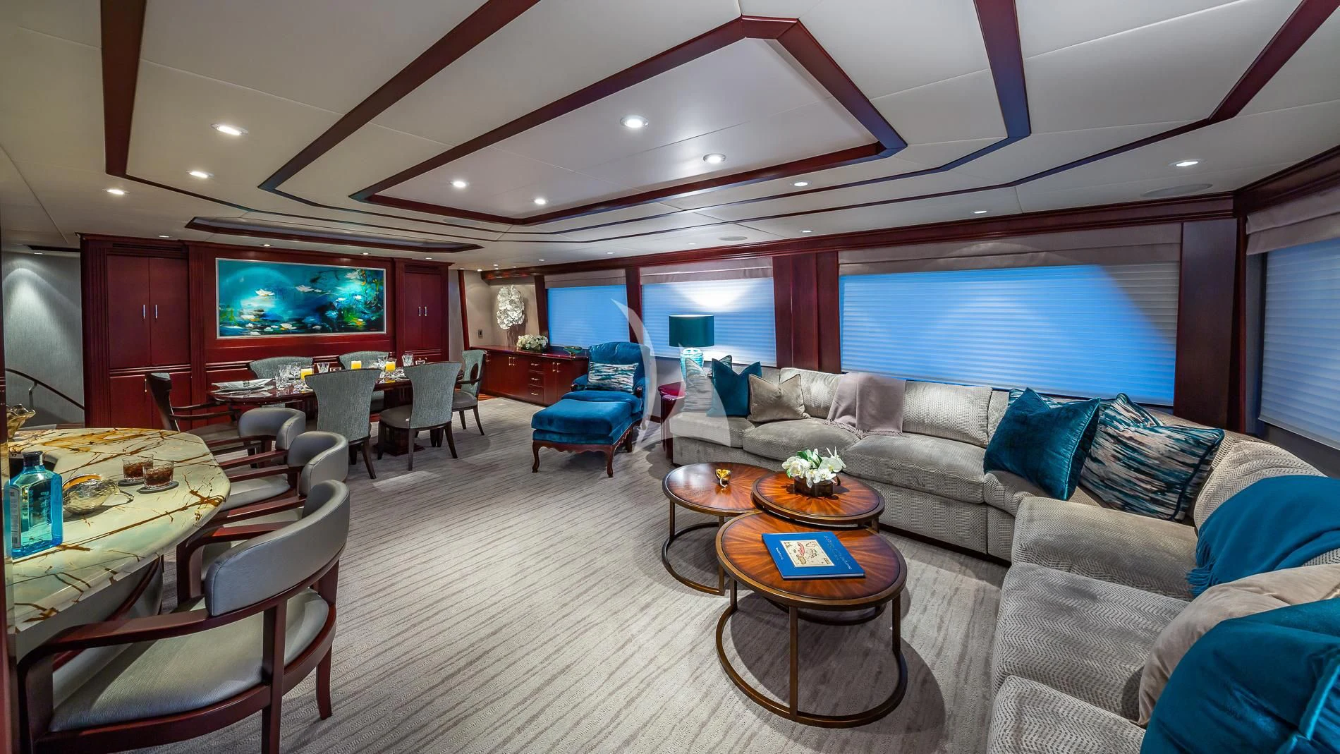 a living room with a large screen aboard DESTINY Yacht for Sale