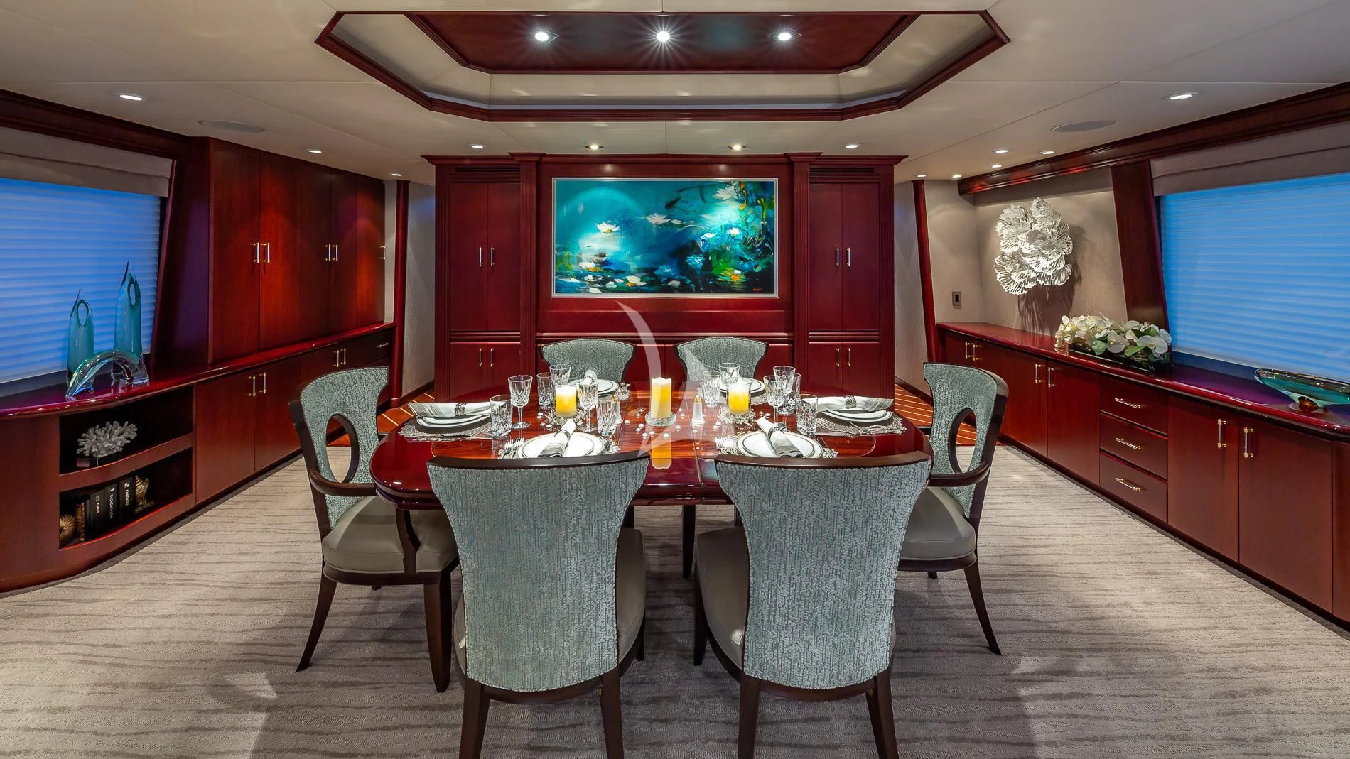 a dining room with a table and chairs aboard DESTINY Yacht for Sale
