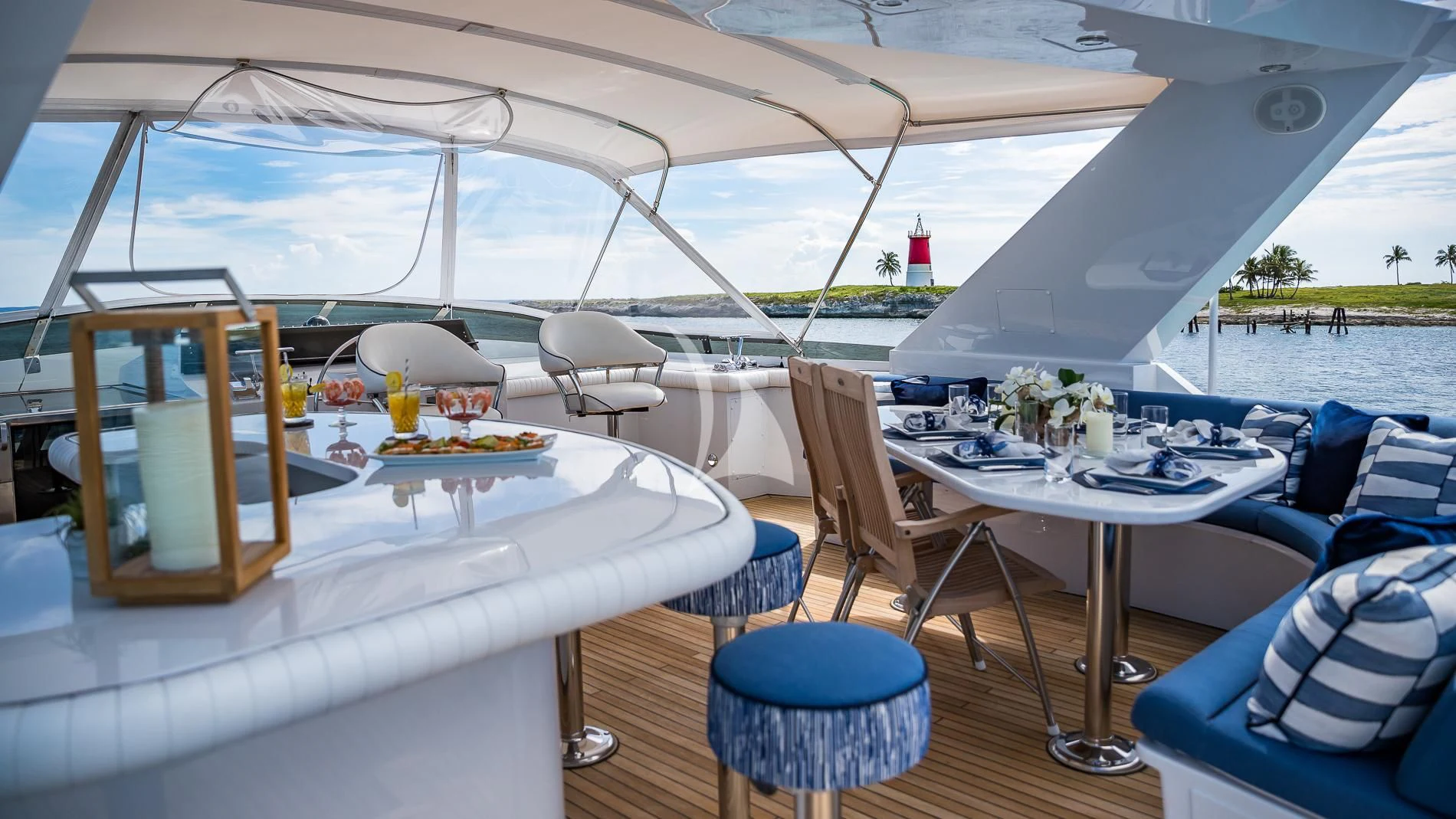 a tent with tables and chairs aboard DESTINY Yacht for Sale