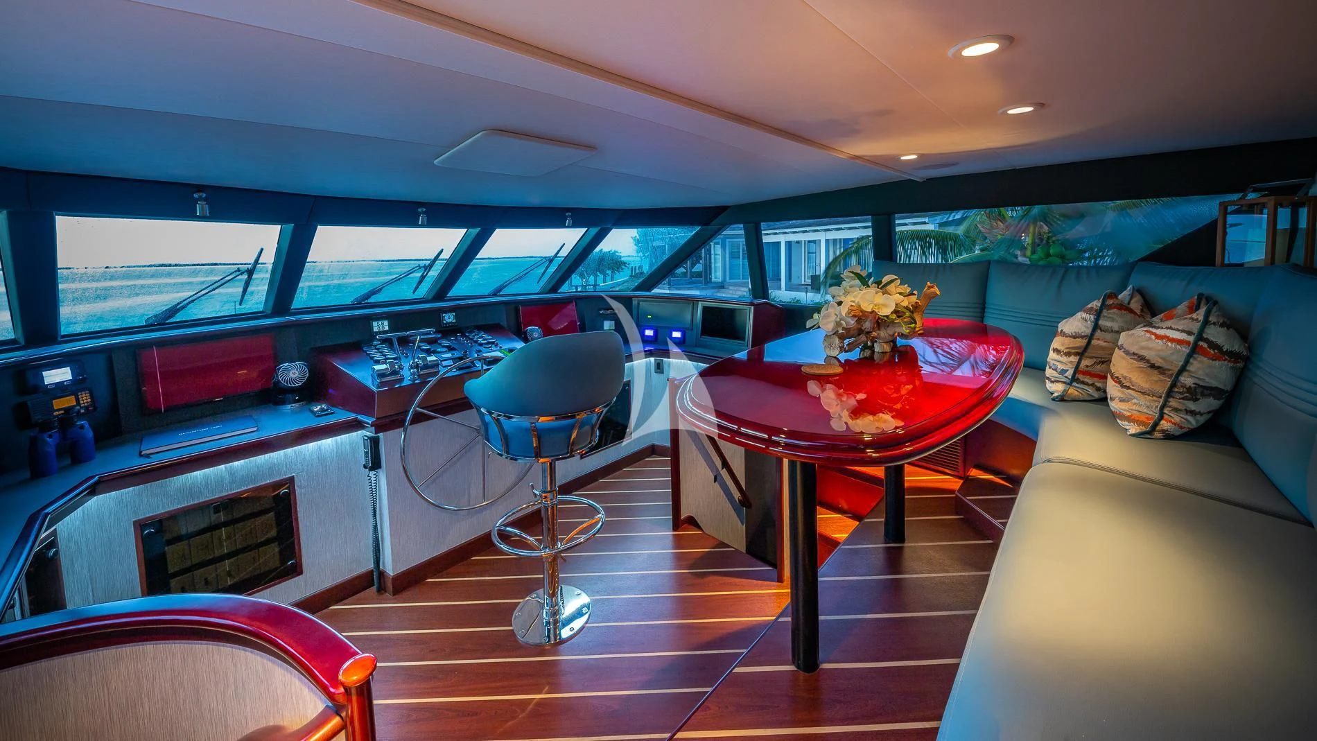 a room with a table and chairs aboard DESTINY Yacht for Sale