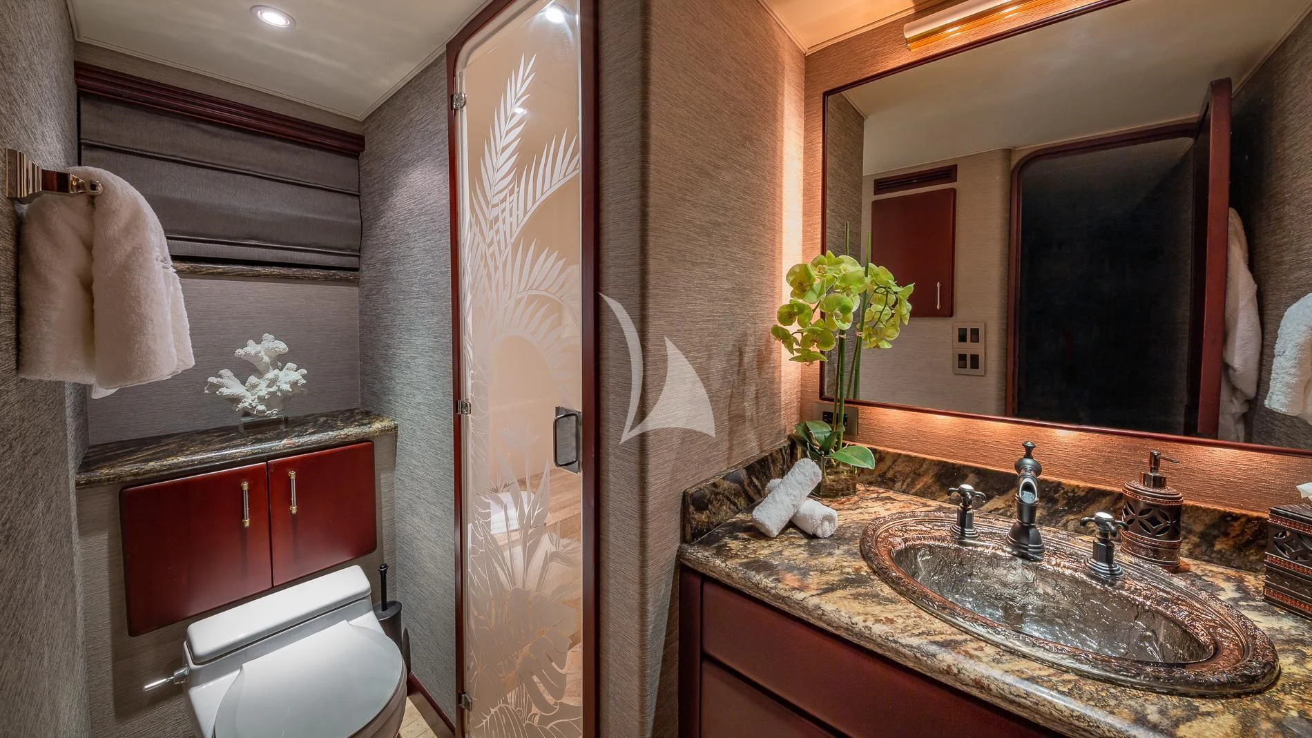a bathroom with a sink and a mirror aboard DESTINY Yacht for Sale